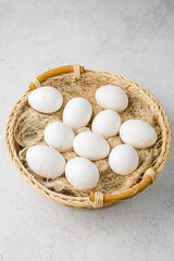 homemade chicken eggs in a wicker basket