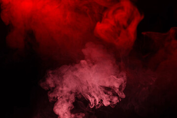 Yellow and pink steam on a black background.