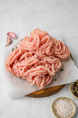 minced poultry and meat on a board