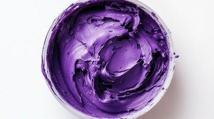 Fototapeta premium Deep purple cream in a separate round bowl, bright white background for contrast.