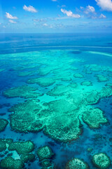 Aerial view of part of the Great Barrier Reef, the world's largest coral reef system composed of...