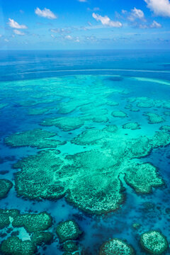 Aerial view of part of the Great Barrier Reef, the world's largest coral reef system composed of over 2,900 individual reefs and 900 islands. Coral Sea,  coast of Queensland, Australia. Dec 2019