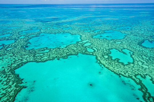 Aerial view of part of the Great Barrier Reef, the world's largest coral reef system composed of over 2,900 individual reefs and 900 islands. Coral Sea,  coast of Queensland, Australia. Dec 2019