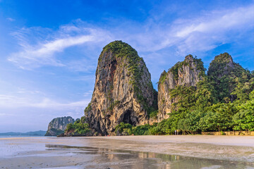 Phra Nang Beach, with its duvet-soft sand, clear shallow water, two small islands, the Koh Rang Nok...