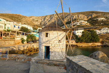 Greek windmill in the port of Aegiali on Amorgos island. Cyclades, Greece