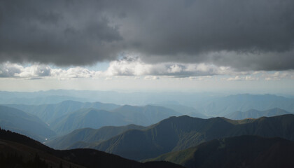 Fototapeta premium Ominous clouds hovering over serene mountain range, nature's contrast