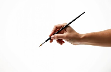 Woman hand holding paintbrush on white backdrop. Artist arm holding pen tool for painting. Concept of art, creativity, drawing, education, design, painting process, art school, art therapy, art