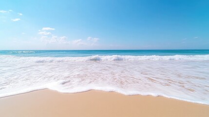 Fototapeta premium Tranquil beach scene with gentle waves (1)