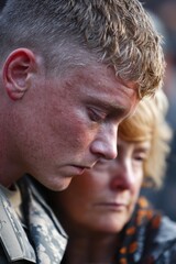 Fototapeta premium Heart-wrenching farewell between a young soldier and his loved ones, captured in golden daylight — ideal for editorial pieces on war, loss, family bonds, or human resilience