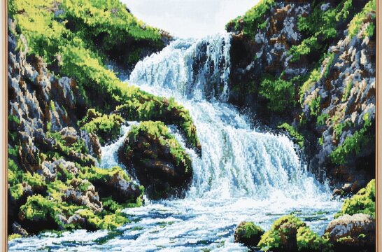Waterfall Oasis: cascading waterfalls tumble gracefully down a rugged mountainside, framed by vibrant greenery and rocky terrain, creating a tranquil and breathtaking spectacle of nature's beauty.