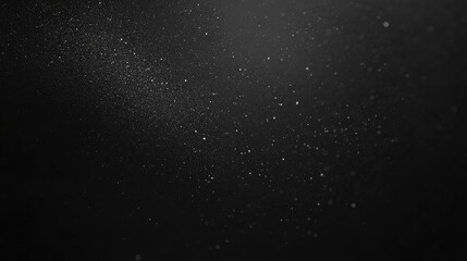 Fototapeta premium A dark backdrop illuminated with shimmering particles creating an enchanting and sophisticated atmosphere for modern artistic interpretations