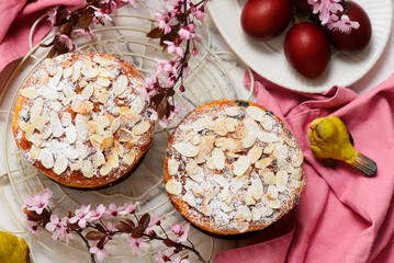 Traditional Easter italian pannetone and painted eggs.