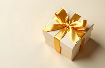 Fototapeta premium Poster with golden gift box with ribbon on beige background with copy space for text, suitable for holiday presents, birthday, anniversary or romantic occasion