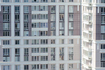 Fototapeta premium Facade of a modern multi-storey residential building