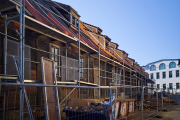 Renovation of an old wooden barn. Wooden beams. Selective focus.