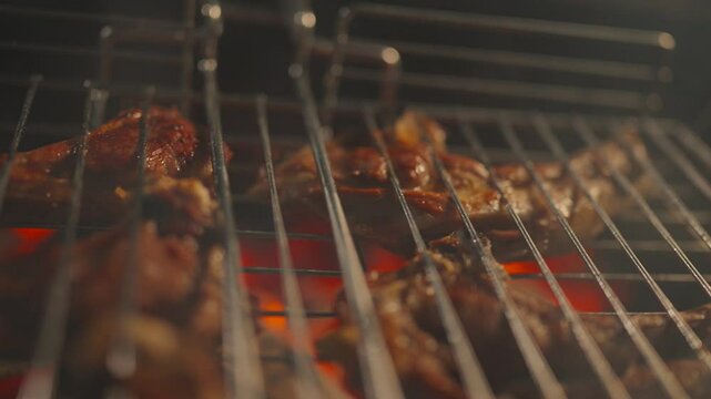 Meat is cooked on the grill, mutton on the grill, the process of cooking mutton on the grill