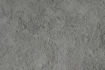 texture of dry grey soil with fine grains and natural irregularities. A neutral earthy background suitable for environmental themes, agriculture, nature studies, and texture overlays.