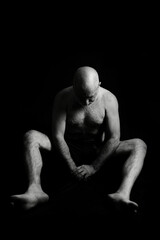 Fototapeta premium man doing stretching exercises yoga calisthenics muscular fitness