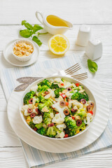 Italian Broccoli Cauliflower Salad in a white bowl