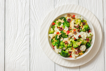 Italian Broccoli Cauliflower Salad in a white bowl