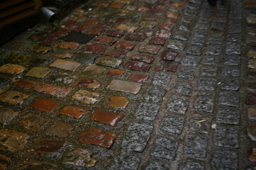 wet French pavement, wet road surface, old stone pavement 