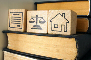 Book and symbols of court and real estate. Inheritance law and property rights.