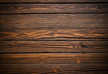 Naklejka premium A close up of a wooden wall with a dark background.
