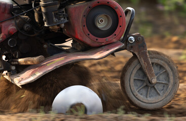 Closeup of a Soil cultivator in a farm for plantation of vegetatbles and crops