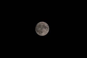 Nocturnal Reverie: Lunar Serenity in Telephoto Portrait