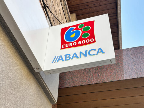Euro 6000 Abanca bank sign displayed prominently on building exterior showcasing modern design and branding elements for financial services industry concept