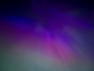 Fototapeta premium Vibrant northern lights in the nights sky