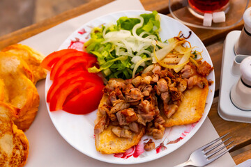 Image of a popular Turkish dish called Kokorech (Kokorec).