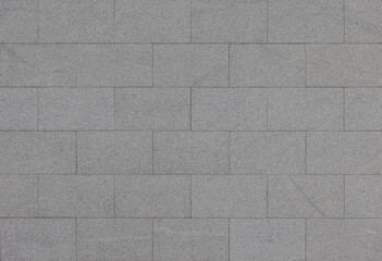 Classic vintage dark grey granite background, Abstract geometric brick blocks pattern texture, Outdoor building block wall, Can be used as background for display or montage your products.