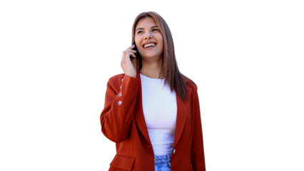 Smiling businesswoman speaking enthusiastically on mobile phone against white backdrop