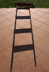 Steps of Light – Ladder Shadows on Tiles