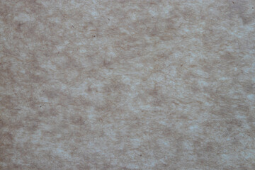 Recycled brown paper texture. Brown caotic fibers on the beige background