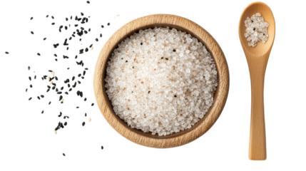 Bowl of salt with wooden spoon on white background. Top view of coarse sea salt mixed with black sesame seeds in a wooden bowl and spoon, perfect for cooking or seasoning visuals.