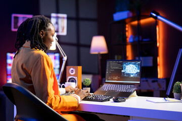 Teleworking programmer using laptop for artificial intelligence computing through self learning...