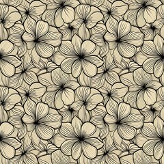 a black and white floral pattern on a beige background