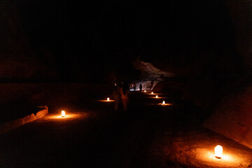 Candles along the Siq gorge, main entrance to the ancient city Petra, during Petra by Night, Jordan