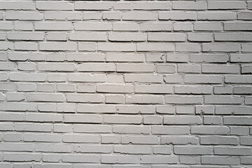 Obraz premium Brick surface. Brickwall background. Pattern of white stonewall. Stone cladding.