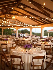 Fototapeta premium Elegant outdoor wedding reception. Romantic ambiance with string lights, flowers, and candlelight.