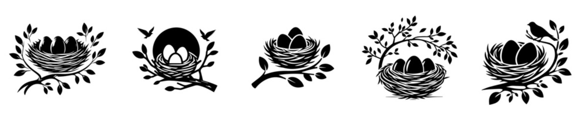 vector set of nest silhouettes with eggs on branches
