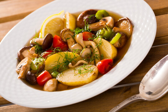 Mushroom hoosh boiled with honey fungus, lemon and vegetables