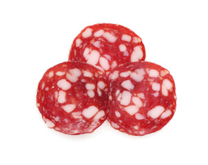 Slices of tasty smoked sausage on white background, top view