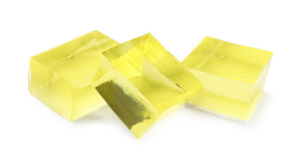 Tasty yellow jelly cubes isolated on white