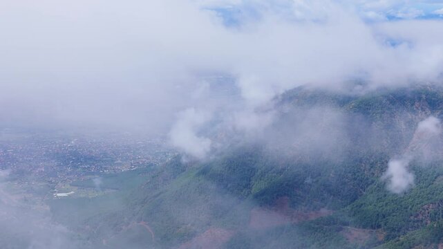 road in the forest and cloudy sky from the mountains, view of mugla koycegiz lake from a distance