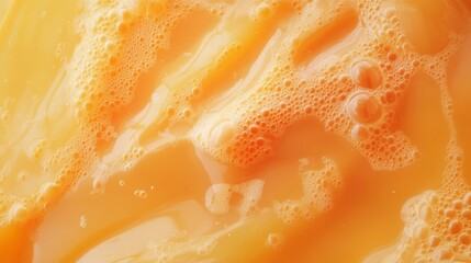 Pulpy orange juice texture in close-up