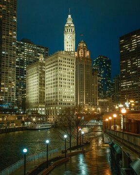 Cityscape skyline view along the Riverwalk at night in Chicago, Illinois