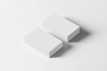 Blank business cards stacked on a clean surface for customizable branding and networking opportunities